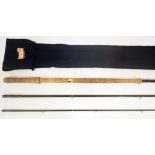 A Bruce & Walker 14' three piece carbon salmon fishing rod, #10-12 weight, with rod bag. Good