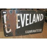A Cleveland guaranteed motor oil double-sided enamel advertising sign 76cmx 46cm.
