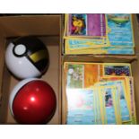 A collection of approx. 3000 Pokemon cards and two Pokemon collectors tins.