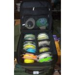 An Airflo padded bag containing 14 spools of fly line.