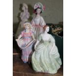 Four figures comprising two Royal Doulton and two Coalport.