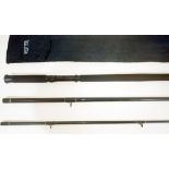 A Normark 13' Black Medallion three part fishing rod with rod bag. Good condition, some light
