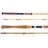 Two vintage fishing rods, one 7' two part spinning rod in bag and another 8'6" two part rod with