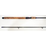 A Masterline Maxim 9' two part carbon spinning rod, 10-40g casting weight. Good condition, some