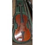 A student violin, with bow and hard case.