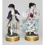 A pair of Volkstedt porcelain figures, height 14.5cm.