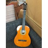 Messina classical acoustic guitar with soft case.