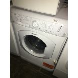 A Hotpoint Aquarius washing machine.