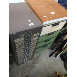 A metal multi drawer with tools, and a four drawer wooden cabinet with tools