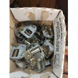 A box of music box movements, as new old stock