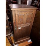 An early 20th century walnut pot cupboard, height 77cm and width 38cm.