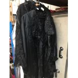 A Victorian cape in lace and frilled neckline and a Victorian jacket with laced and frilled