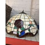 A large Tiffany style lamp shade.