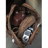 A vintage holdall containing various cameras, accessories, etc to include Yashica Super-8 10 movie