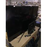 A Samsung TV Model No. UE50MU6120K with remote and a Venturer 15.6"HD ready LCD TV with remote