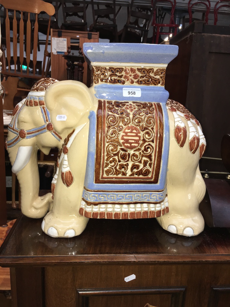 A Chinese pottery elephant plant stand, height 42cm.