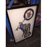 A pop art Harley Davidson framed picture.