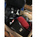 A box of cameras and accessories to include Minolta, Olympus, etc and a pair of old binoculars in