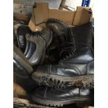 A box of Brashers, Dr Martens boots, etc