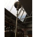 A retro mid 20th century aluminium standard lamp/ uplighter, height 161cm.