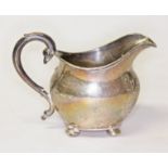 A Victorian hallmarked silver cream jug, length 13cm, weight 4oz.