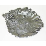 A Victorian silver grape dish, formed as overlapping vine leaves with grape and vine handle, on