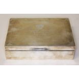 A George V silver cigarette box inscribed 'Marke Wood Prize, E. H. Taylor, Easter Term 1930',