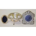 A mixed lot of silver comprising two photograph frames and an imported dish by S Kirk & Son,