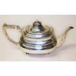 A George III silver teapot, maker's mark indistinct, London 1815, length 29cm, weight 16 3/4oz.