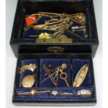 An antique jewellery box containing an Edwardian opal set bar brooch marked '9ct', a hallmarked