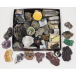 A mineral collection including many matrix and crystal specimens, geodes, gold ore, together with a