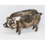 An Edwardian novelty silver pin cushion modelled as a pig, Adie & Lovekin, Birmingham 1905, length