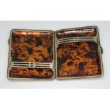 A hallmarked silver cigarette case with tortoiseshell lined interior, length 8cm.