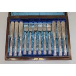 A cased set of twelve hallmarked silver handled fish eaters.