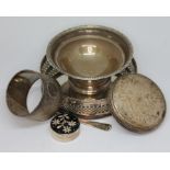 A mixed lot of hallmarked silver comprising a serviette ring, a coaster, a pedestal bowl, a