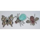 A group of three multi-gem stone brooches modelled as insects comprising a butterfly, a spider and a