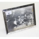 A silver photograph frame, Birmingham 1909, length 24cm.