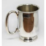 A hallmarked silver tankard, height 8cm, weight 2oz.