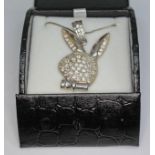A Playboy bunny pendant on chain, both marked '925', with Warren James box.