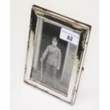 A silver photograph frame, Chest 1915, length 16cm.