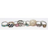 Nine assorted dress rings marked '925', various settings, gross weight 46.59g, size P.