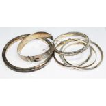 A group of bangles comprising two hallmarked silver and four marked '925' or similar.