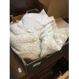 A box of misc lace and linen.