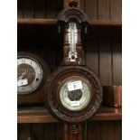 An aneroid barometer.