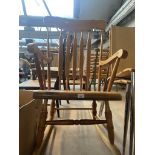 A pine rocking chair.