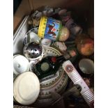 A box of ceramics and collectables.