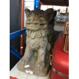 A pair of concrete foo dogs