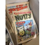 A box of vintage comics.