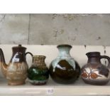 A Doulton stoneware coffee pot and three west German pottery vases