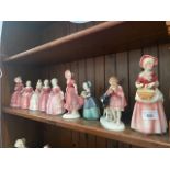 Nine assorted Katzhutte figurines- medium size including woman with cow and women holding flowers.